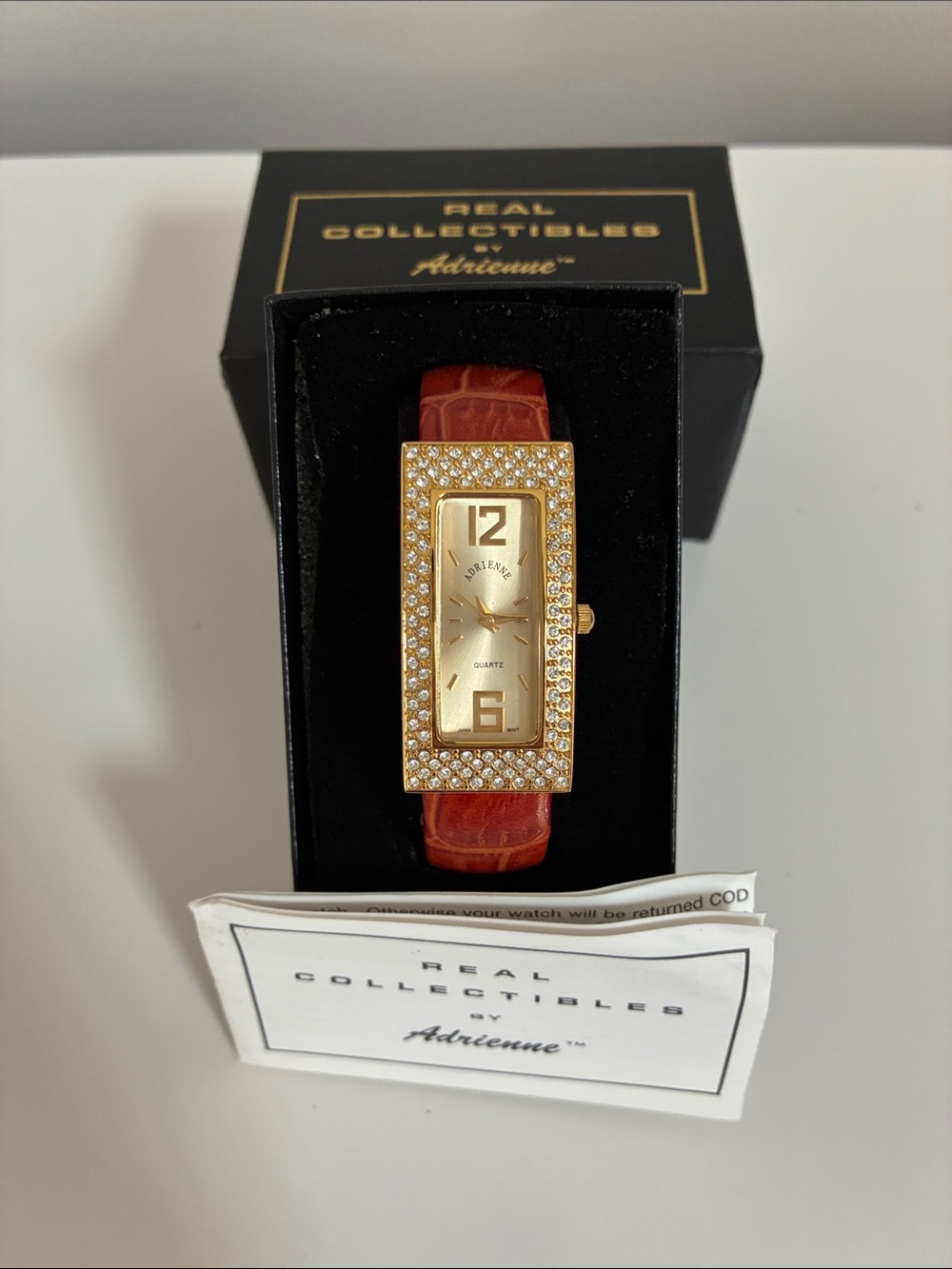 Adrienne Real Collections Gold Tone Crystal Studded Watch, Red Bangle Band - New